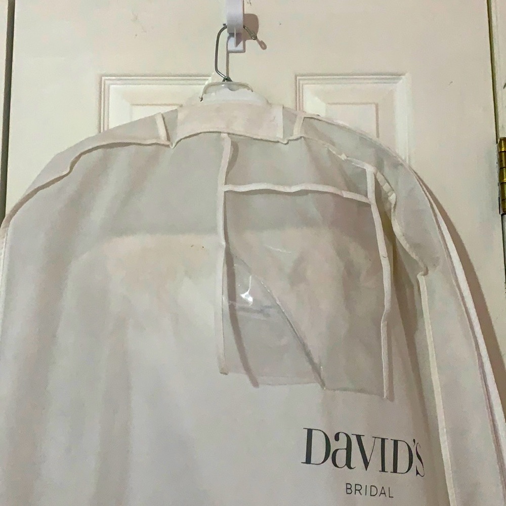 Worn once, from David’s Bridal. Steamed, post-wear, with some staining.